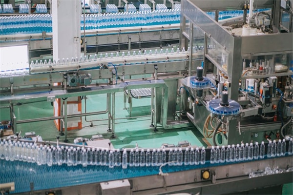 Mineral water Factory production line at finishing line in a row moving queuing for packing